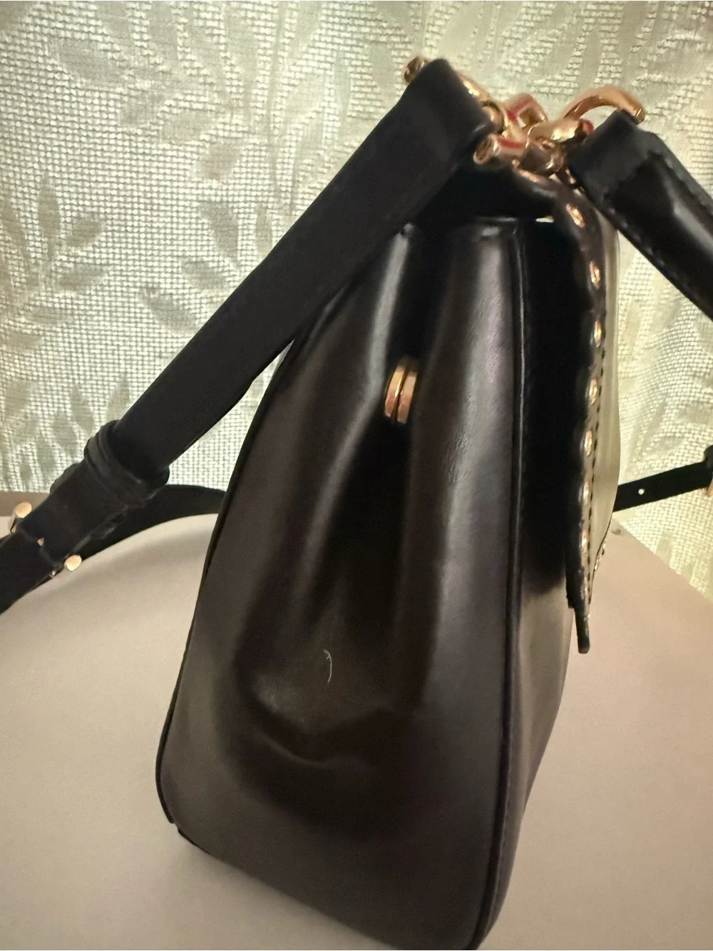 Elegant Black Leather Shoulder Bag with Gold Accents